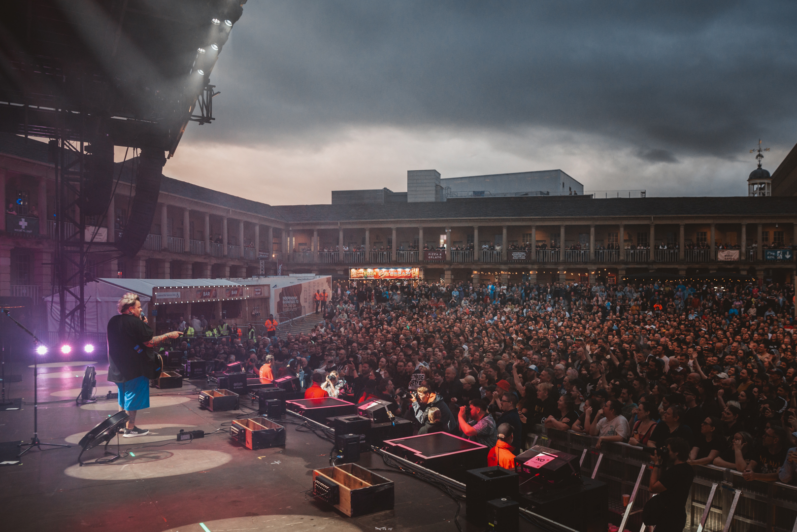 Open-air concert at Halifax Piece Hall with large crowd