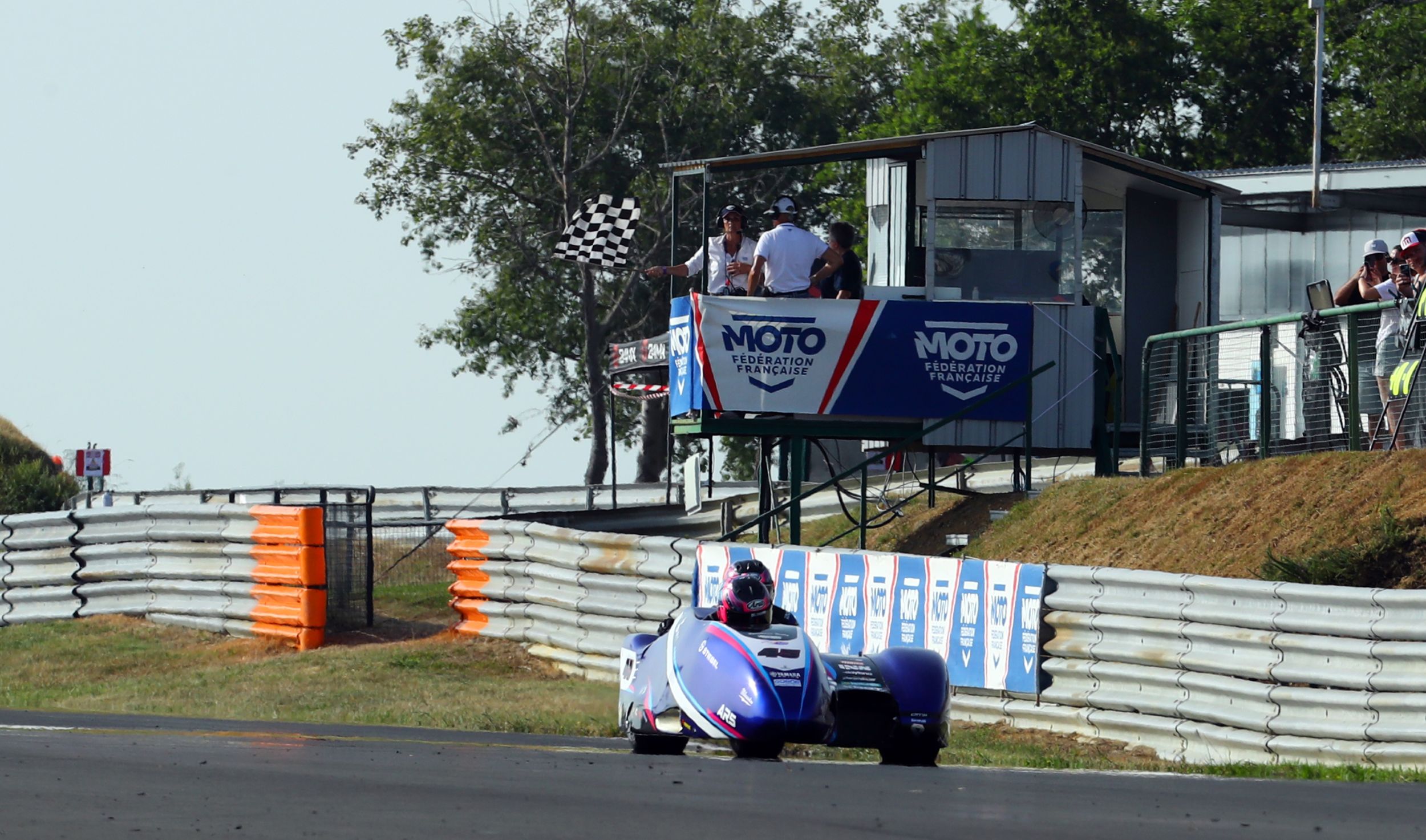 Motorcycle sidecar racing at Oliver's Mount circuit