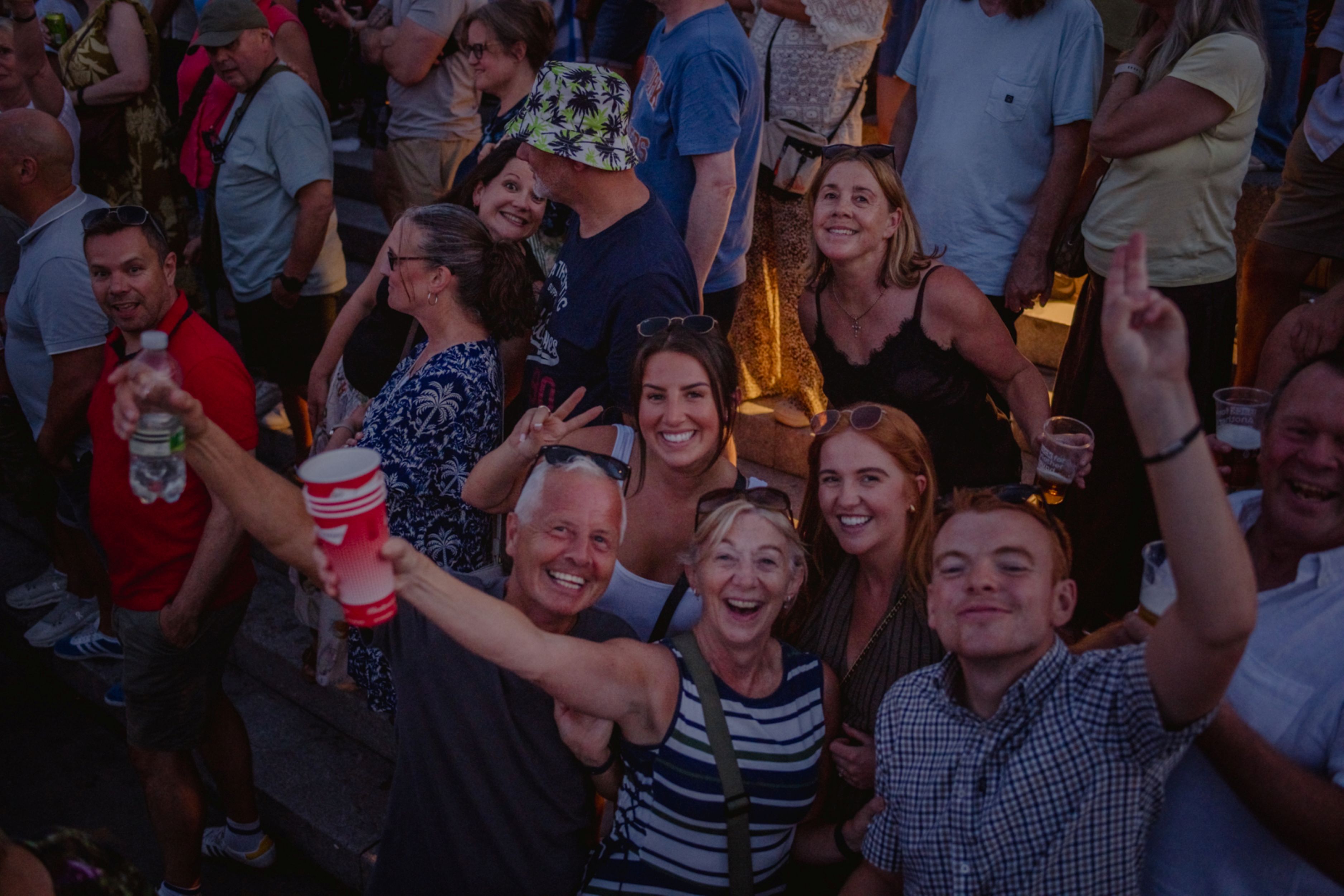 Group of people enjoying a lively outdoor festival in Yorkshire
