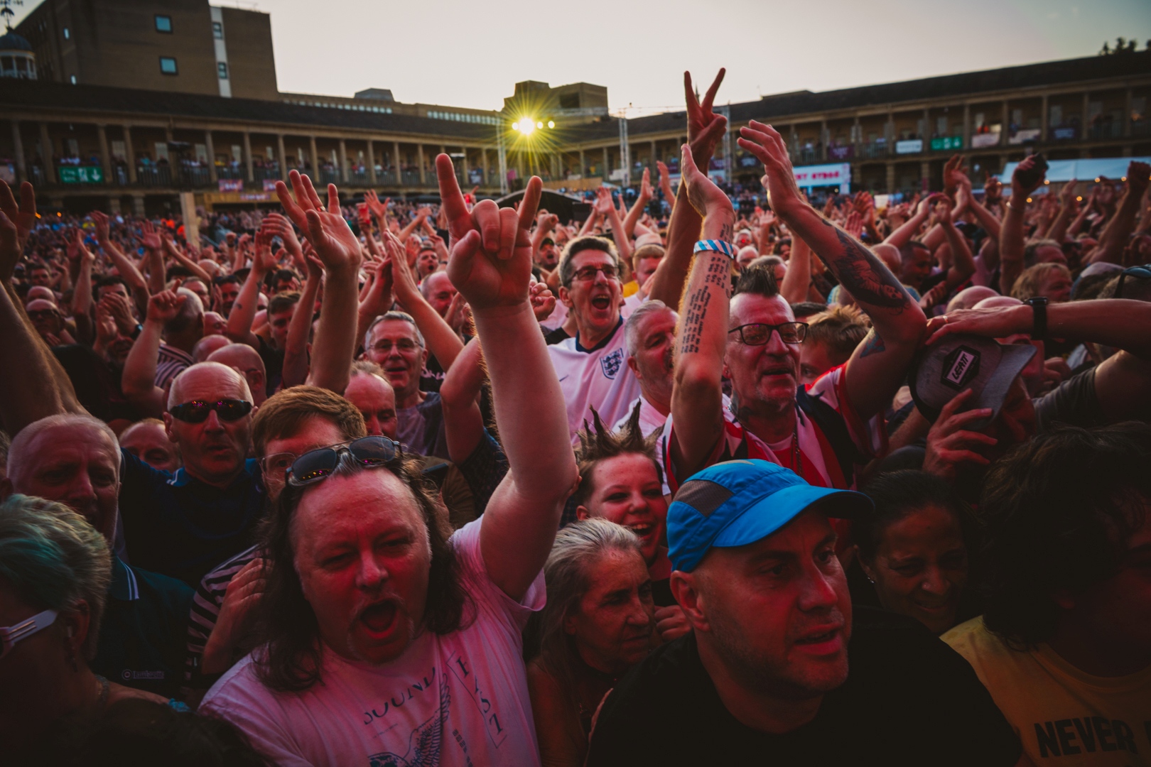 Lively crowd at outdoor music festival in Halifax courtyard