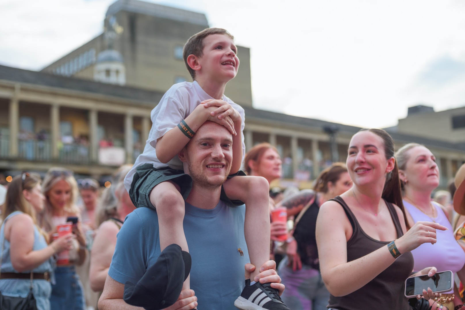 Crowd enjoying outdoor festival with historic buildings - ELLIE SAXX AT THE PIECE HALL