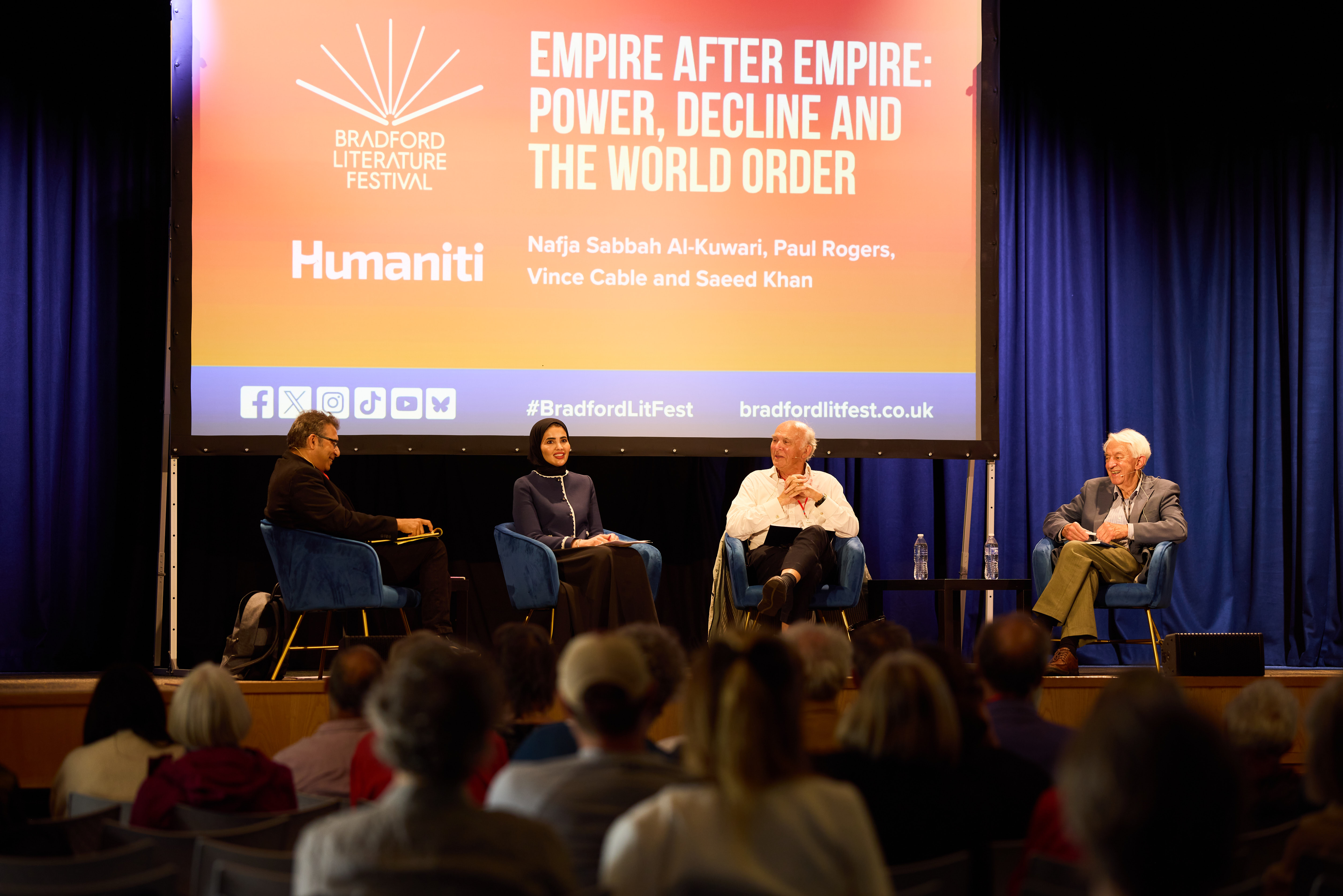 Panel discussion at Bradford Literature Festival with four speakers on stage