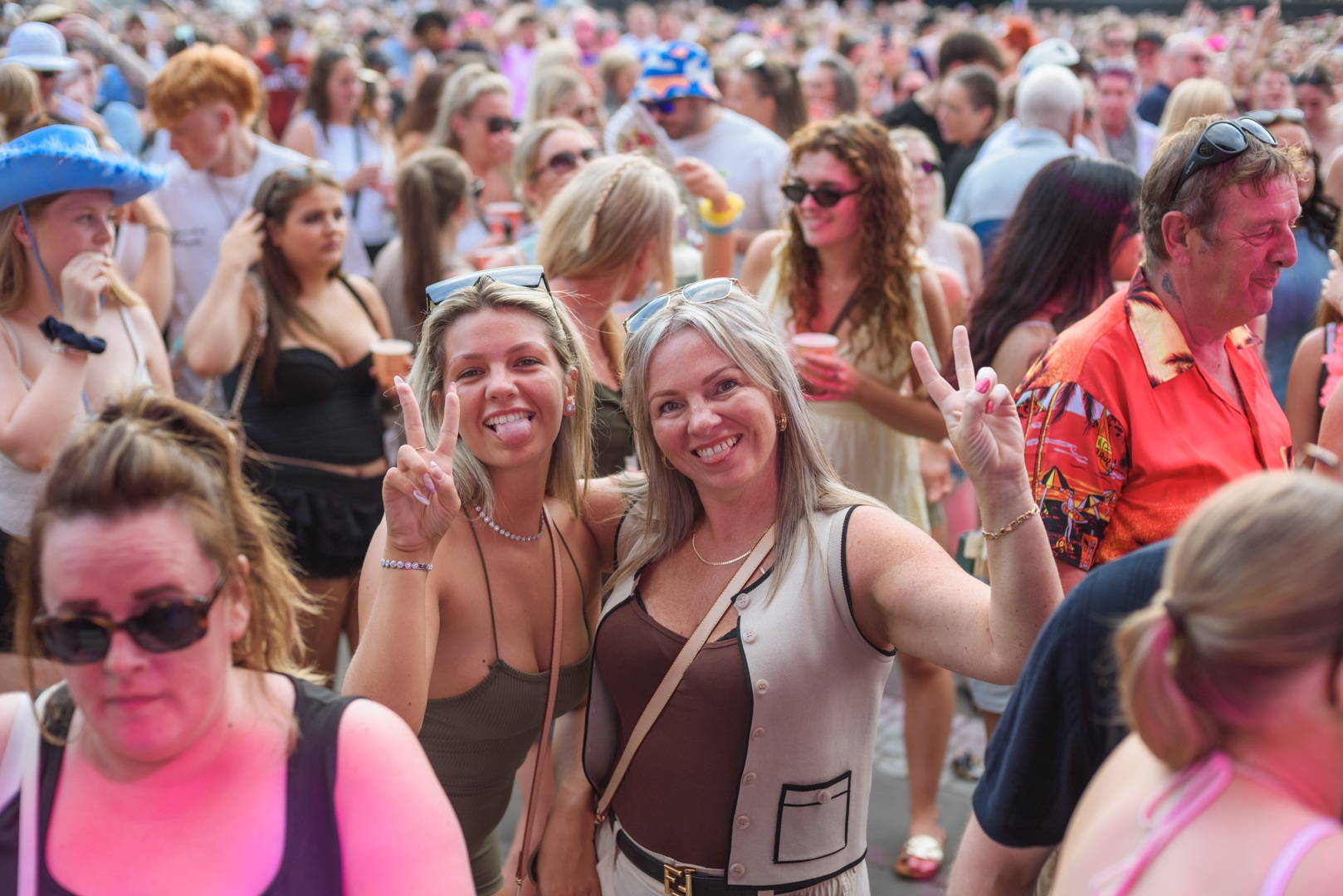 Smiling crowd at outdoor festival in Yorkshire summer - ELLIE SAXX AT THE PIECE HALL