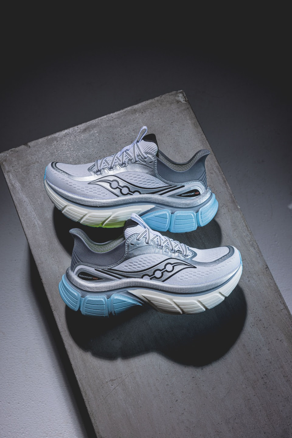 Pair of modern running shoes with grey and blue accents