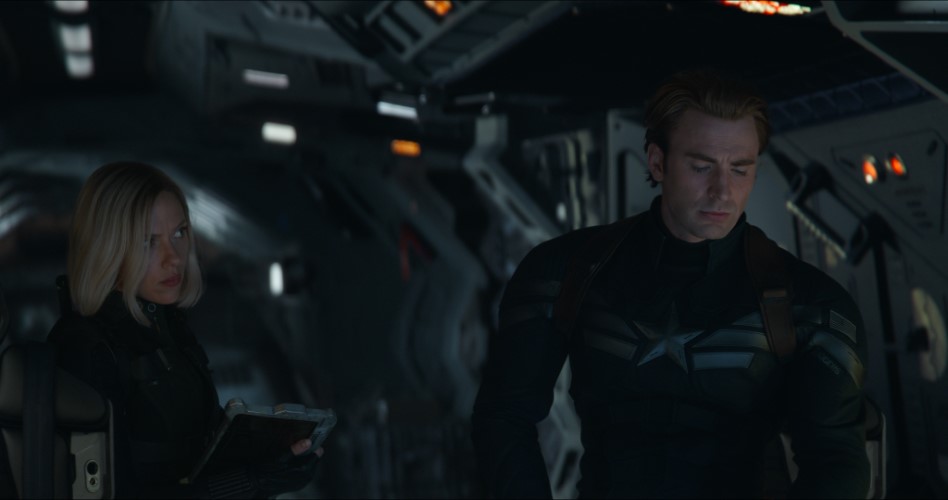 Modern interior of a futuristic spacecraft with two people