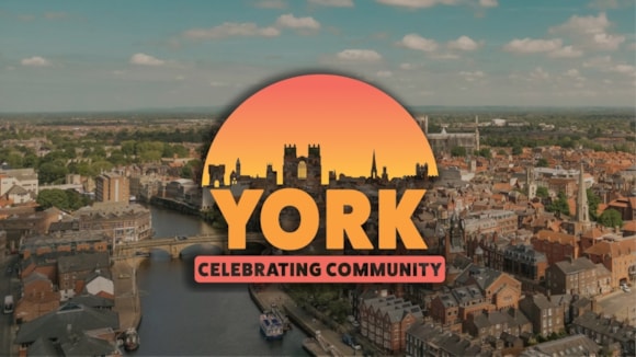 Aerial view of York skyline with river and historic buildings