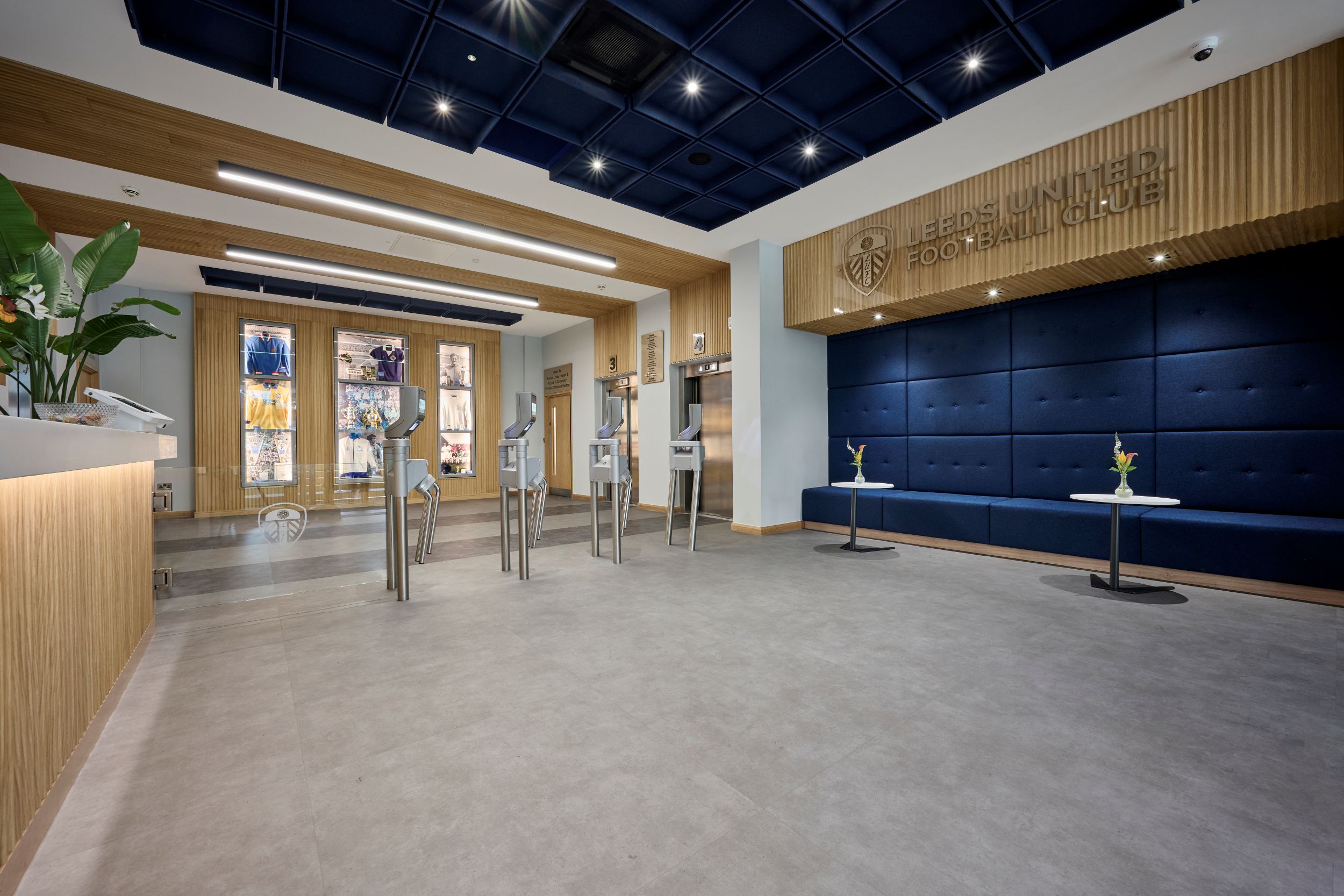 Modern Leeds United reception area with blue and wood accents