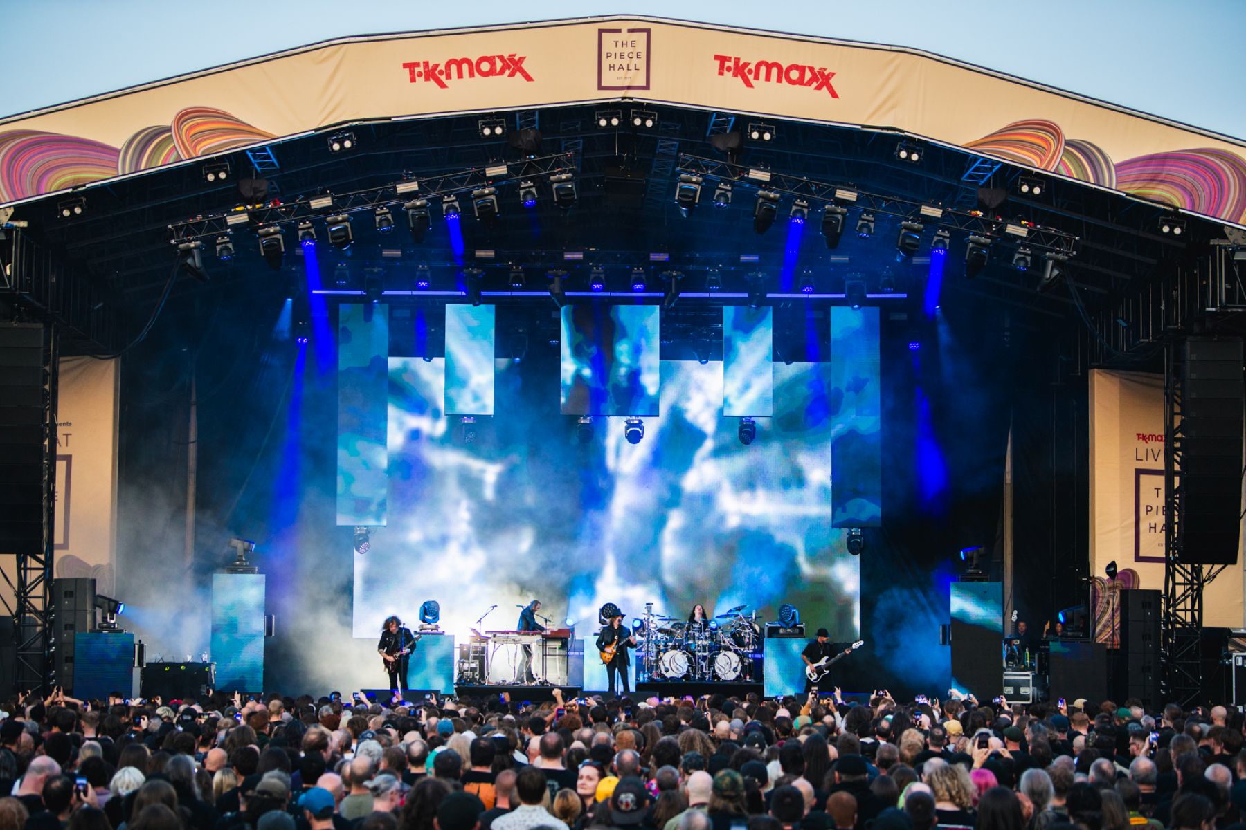 Outdoor concert at The Piece Hall with colourful stage lights