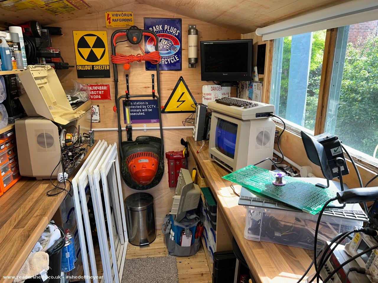Retro computer workshop with vintage electronics and tools