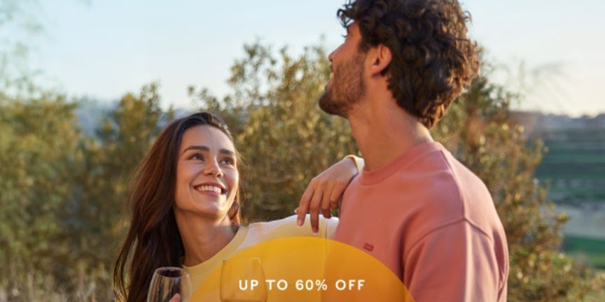 Smiling couple enjoying sunny day in rustic setting