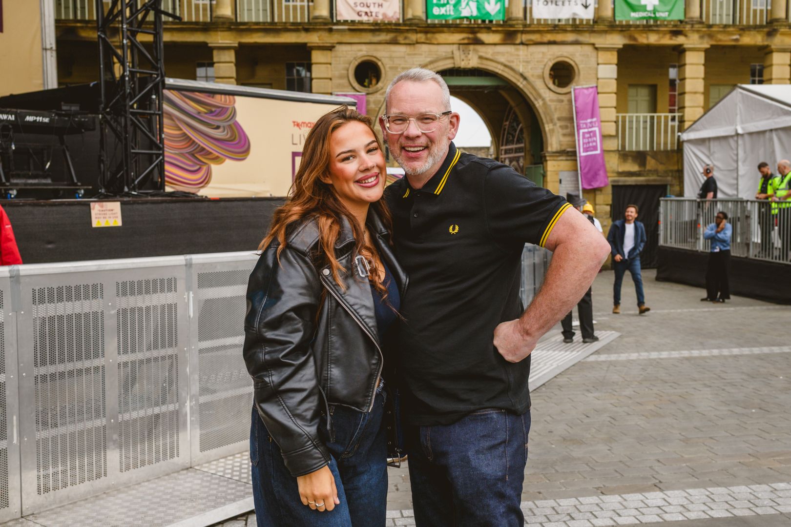 Smiling people in casual attire at outdoor event in Yorkshire