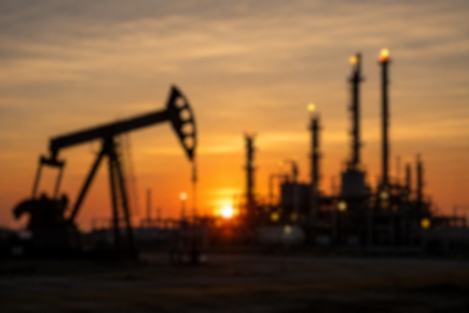 Silhouette of an oil rig and refinery at sunset in Yorkshire