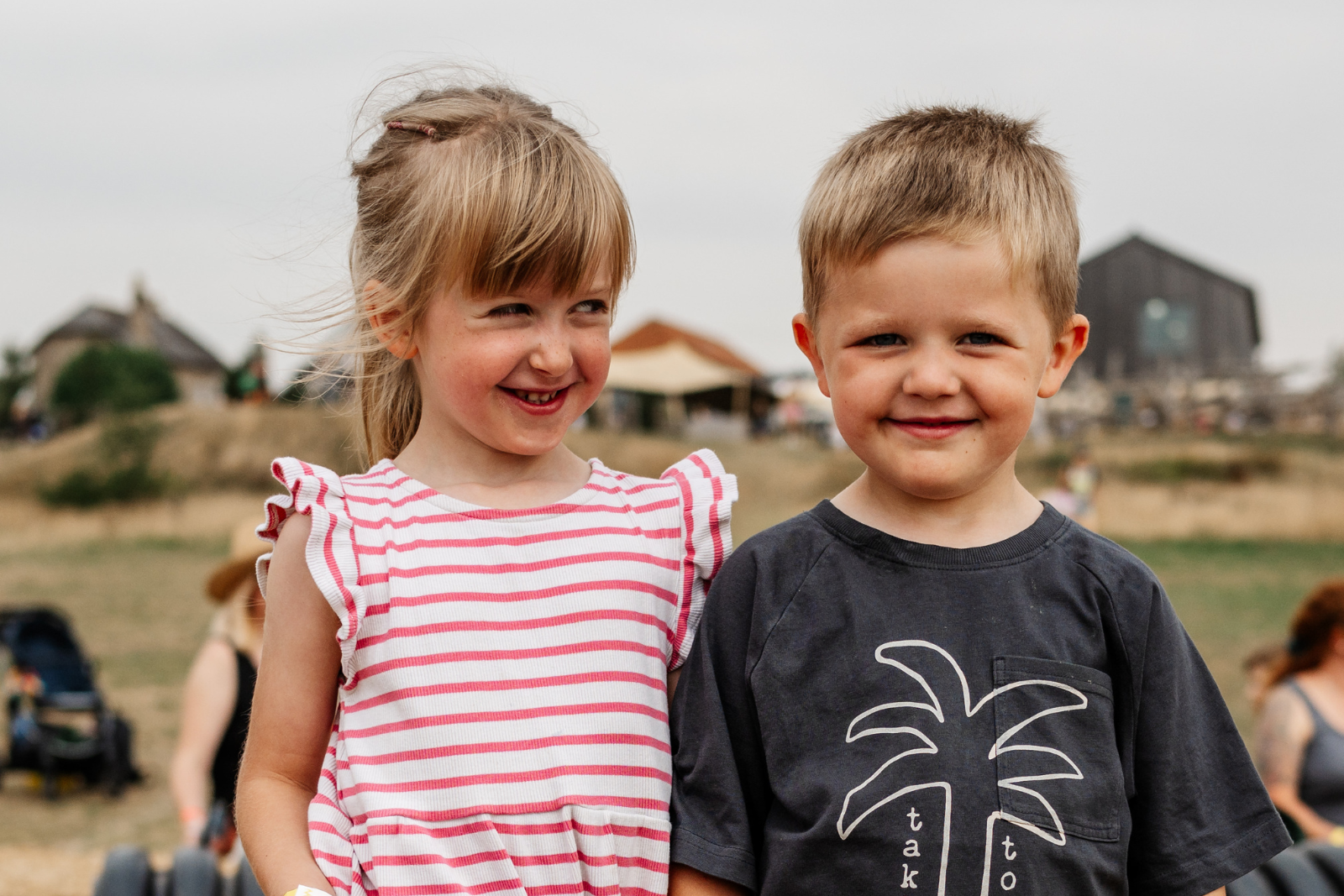 Smiling children in summer clothes at a Yorkshire festival