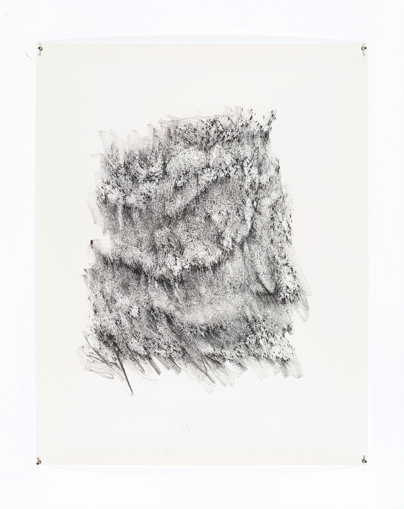 Abstract charcoal sketch with textured patterns on white paper