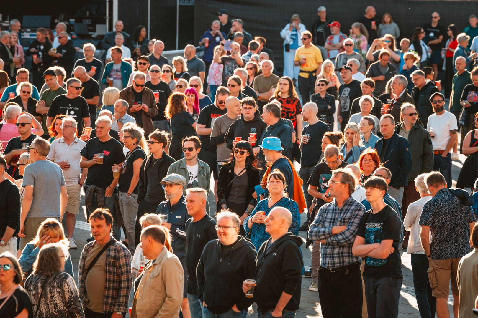 Crowd gathered at sunny outdoor festival in Yorkshire