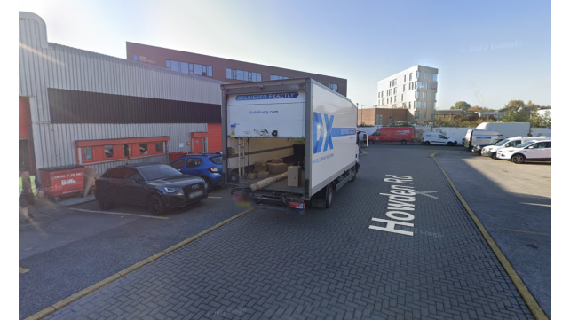 Pay & Display parking area in Attercliffe, Yorkshire, with a delivery truck and several parked vehicles.