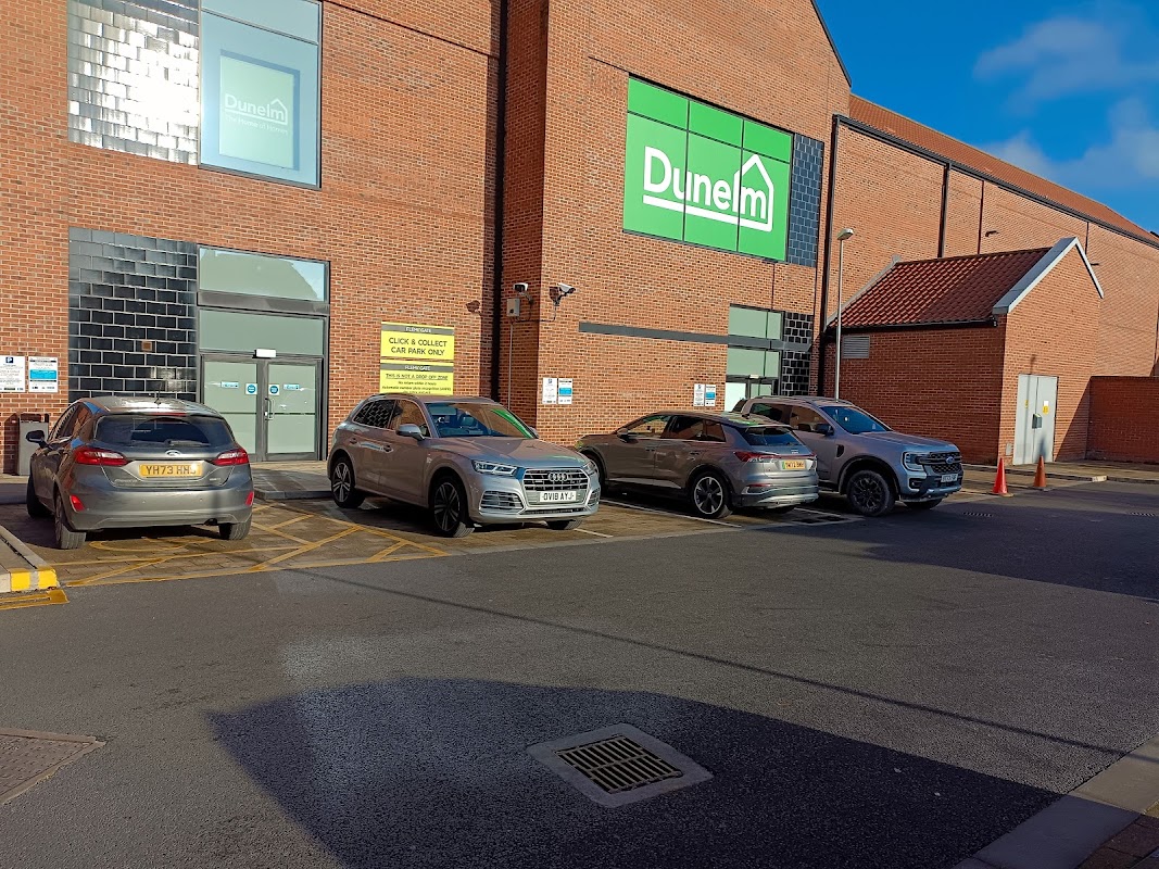 Flemingate Short Stay Click and Collect Car Park with parked cars and Dunelm store in Beverley, Yorkshire.