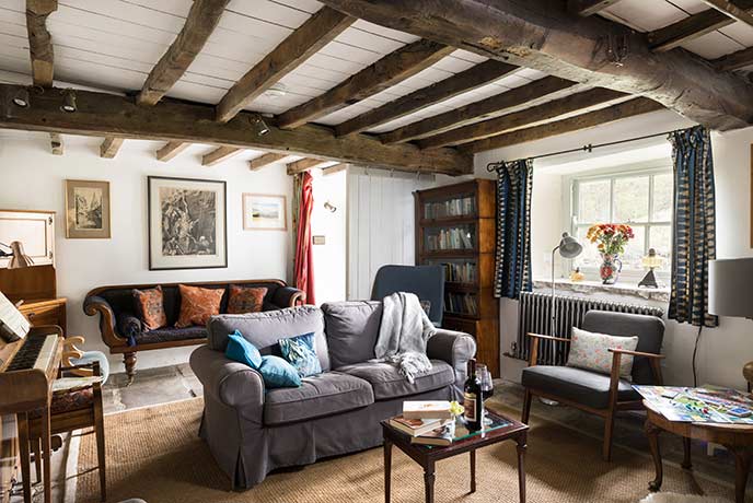 Nettlebed has a rustic sitting room with exposed beams and cosy seating