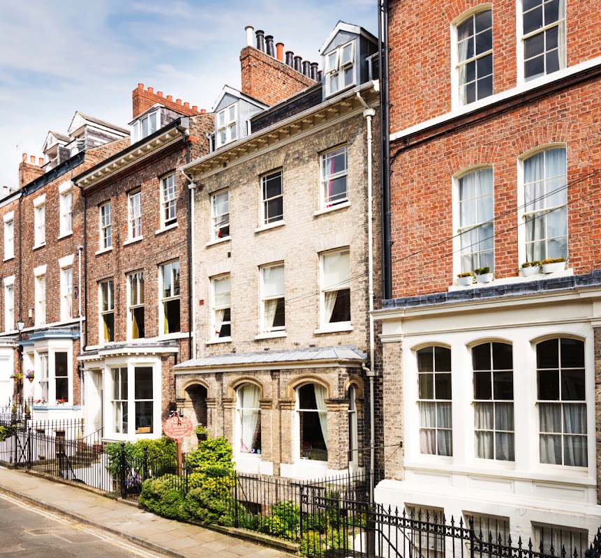 Victorian-style guest house with brick facade, inviting entrance, and decorative windows in York, Yorkshire.