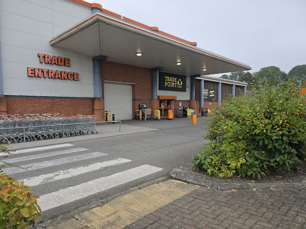 TradePoint York entrance with shopping carts, signage, and a landscaped area in front.
