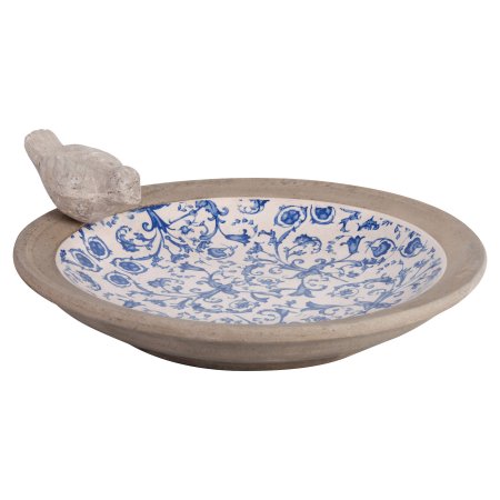 Classic ceramic garden bird bath featuring a blue floral design on a white interior, with a textured gray concrete rim and a small bird figurine perched on the edge.