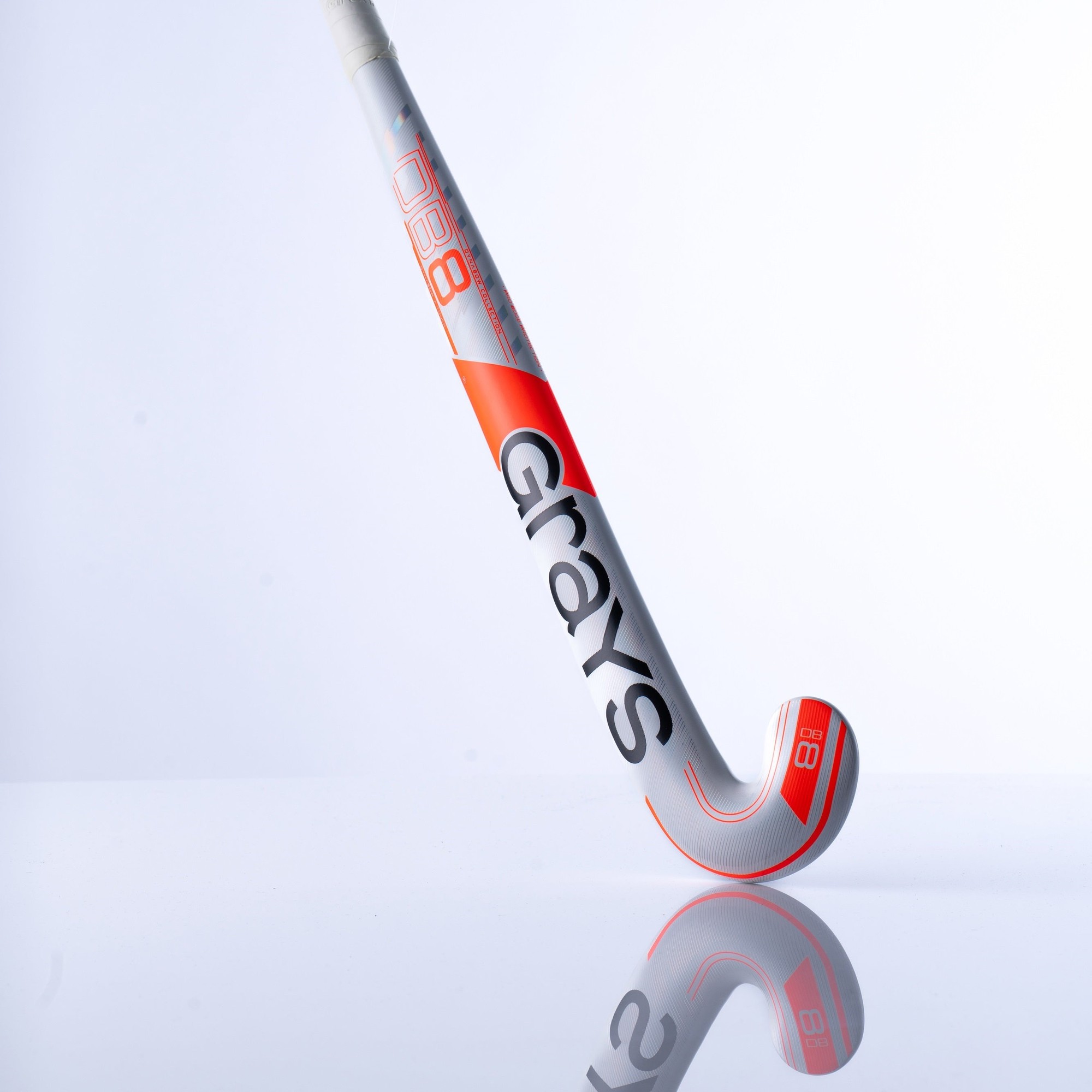 White composite hockey stick with a curved head, featuring red accents and "Grays" branding, labeled as "DB8" and "Limited Edition."