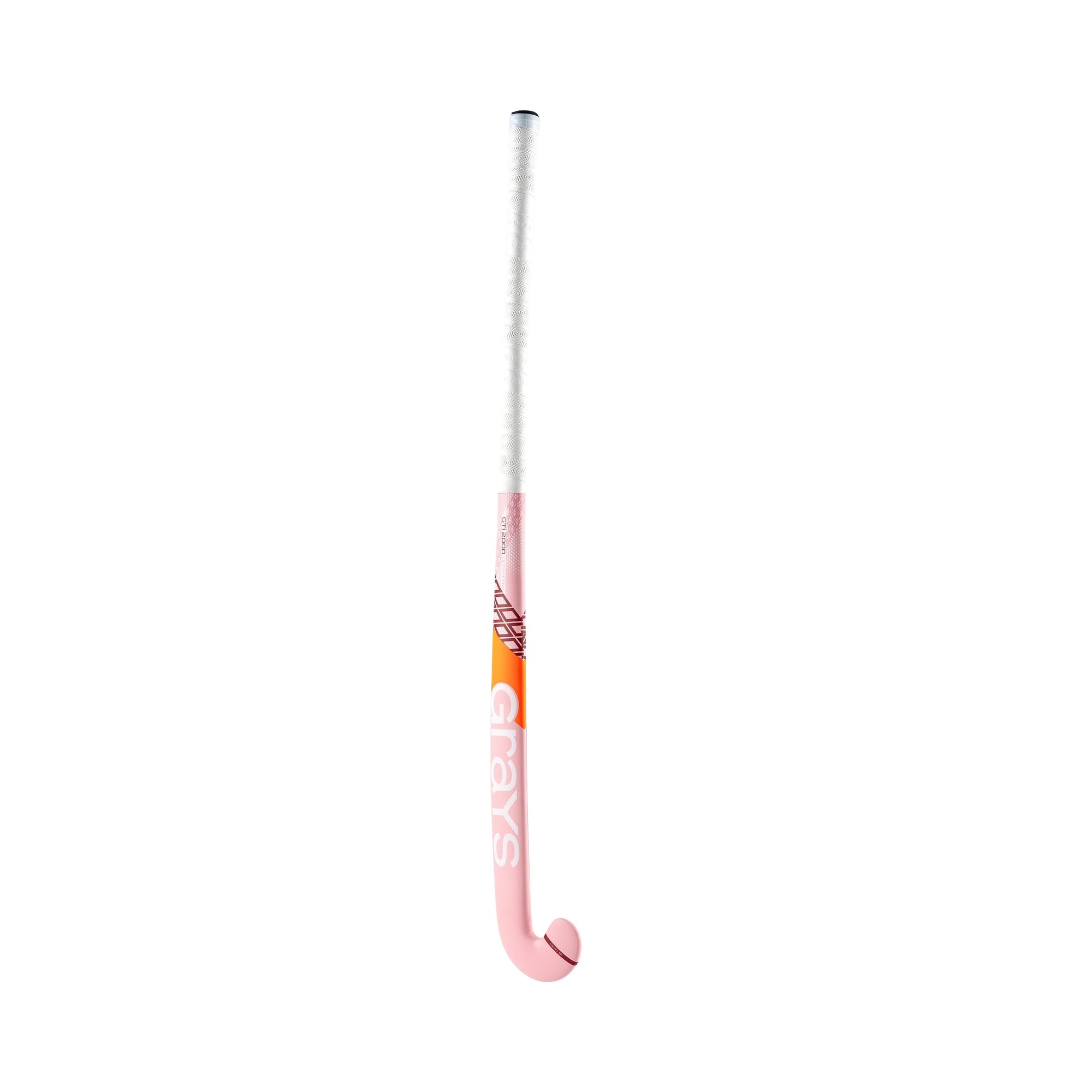 Pink and white composite hockey stick with a curved hook, featuring the Grays logo and a vibrant orange accent, designed for indoor play.