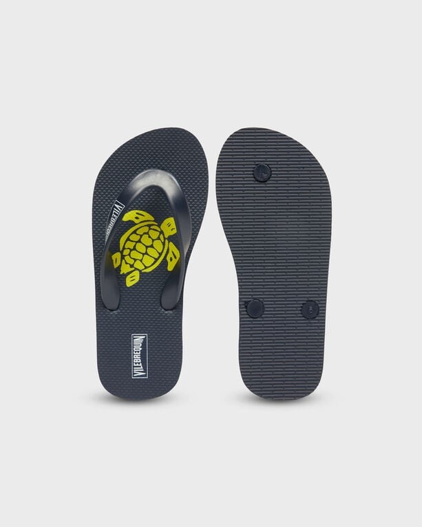 Green kids' flip flops featuring a turtle design on the footbed, made of rubber with a textured sole for grip, size 31/32 by Vilebrequin.
