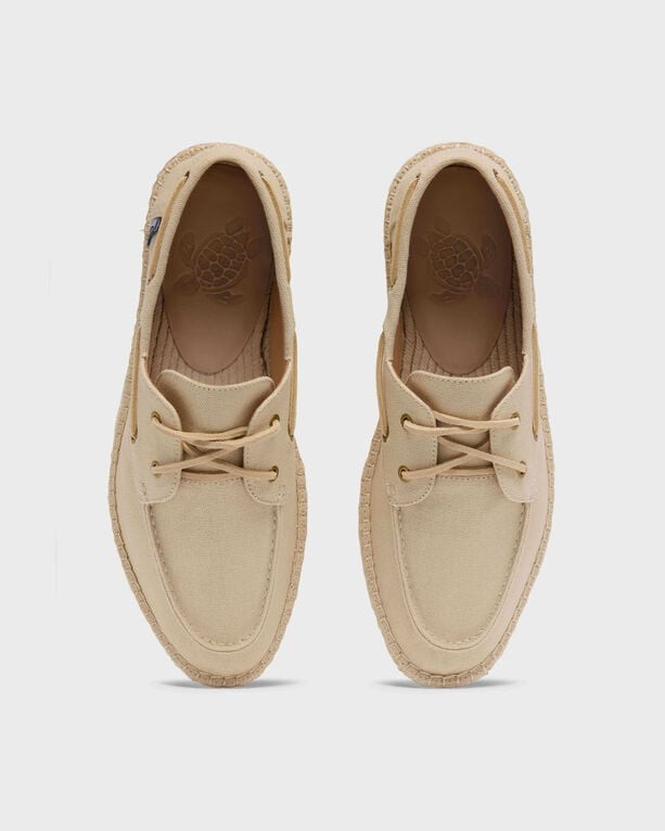 Men's white canvas loafers by Vilebrequin, featuring a classic design with a round toe, lace-up front, and a textured sole, size 45.