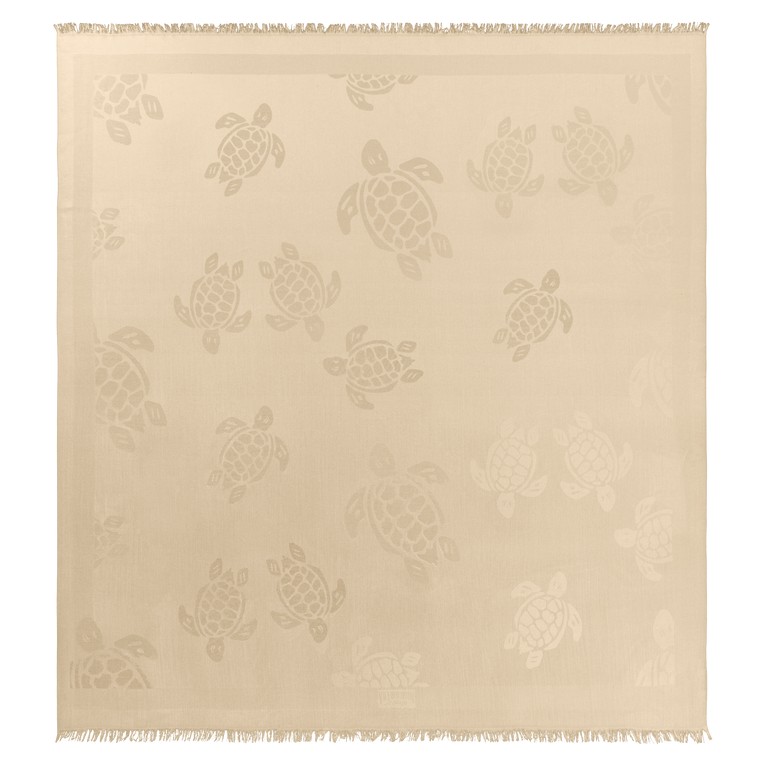 Beige scarf featuring a subtle turtle pattern, made from soft material, with fringed edges, designed by Vilebrequin in a one-size-fits-all format.