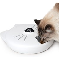 White Catit Pixi Smart 6 Meal Feeder with cat ears design, digital display, and a cat eating from the open compartment.