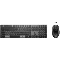 Black HP wireless keyboard with scissor keys and matching ergonomic mouse, includes USB receiver.