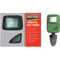 Green ultrasonic cat repeller with solar panel and mounting stake, by Pest-Stop Systems.