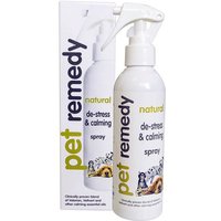 White Pet Remedy Calming Spray bottle with green text and trigger nozzle, next to matching box with animal illustrations.
