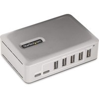 Gray StarTech.com 7-Port USB-C Hub with 5 USB-A and 2 USB-C ports, compact design, includes 65W power supply.