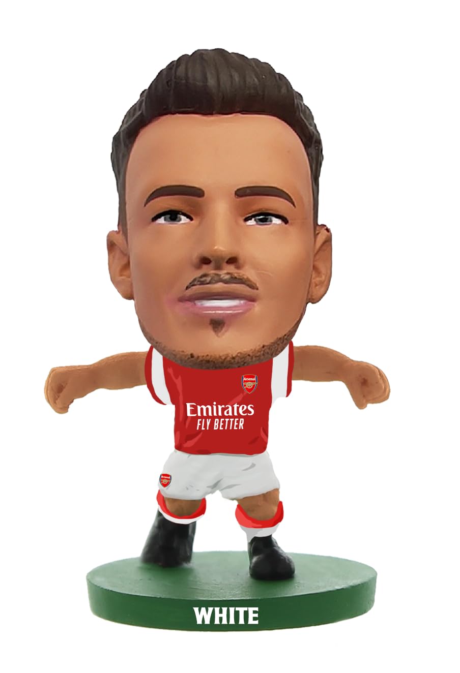 Arsenal SoccerStarz figurine of Ben White in a red home kit with white accents, featuring the Emirates logo, standing on a green base with "WHITE" printed on it.