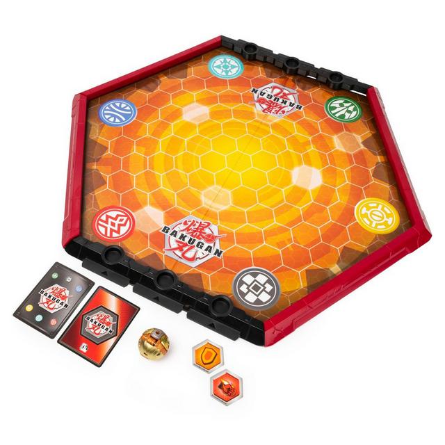 Hexagonal battle arena with a vibrant orange and yellow honeycomb design, featuring six colored symbols, two cards, and a Bakugan ball in the center.