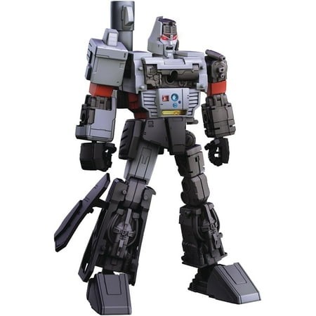 G1 Megatron model kit in gray and black plastic, featuring a detailed robot design with a cannon arm, red accents, and a distinctive helmet, standing on a flat surface.