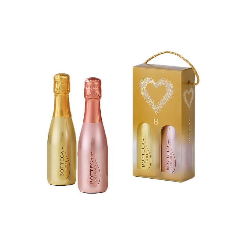 Gold and pink mini bottles of Bottega sparkling wine in a decorative gift box featuring a heart design and a handle, ideal for gifting.
