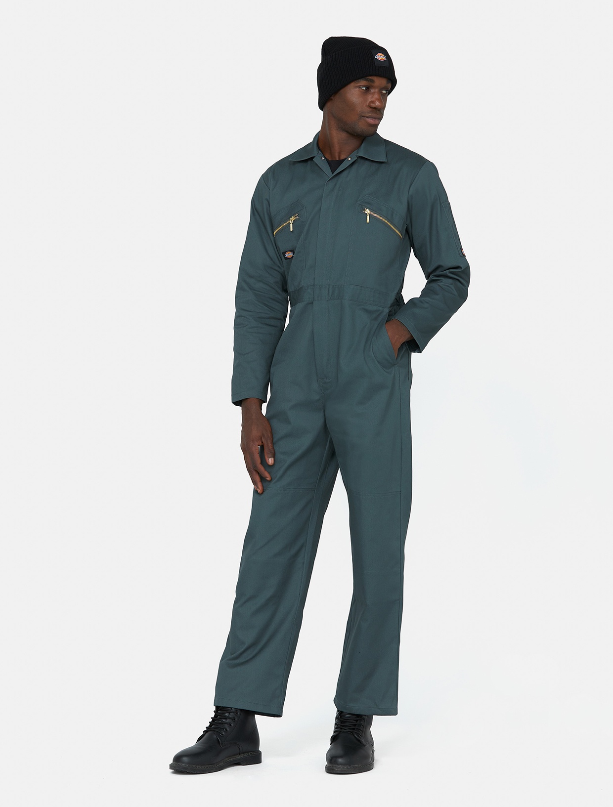 Men's Dickies Redhawk coverall in Rain Forest green, featuring a zip front, two chest pockets with zippers, long sleeves, and a relaxed fit, made from durable fabric.