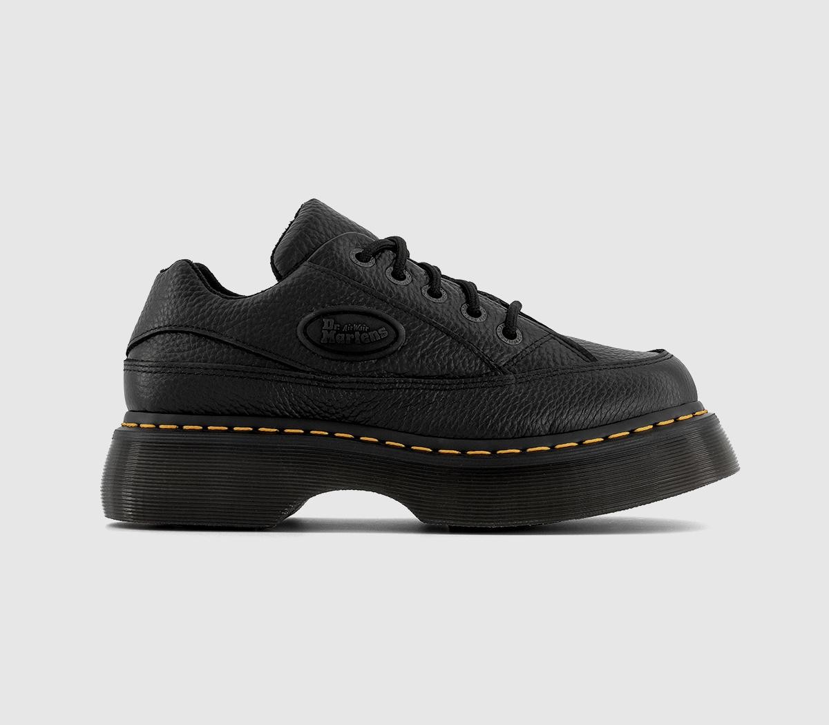 Black milled nappa leather Dr. Martens women's Buzz 5-eye shoes featuring a chunky 3-inch platform sole and signature yellow stitching.