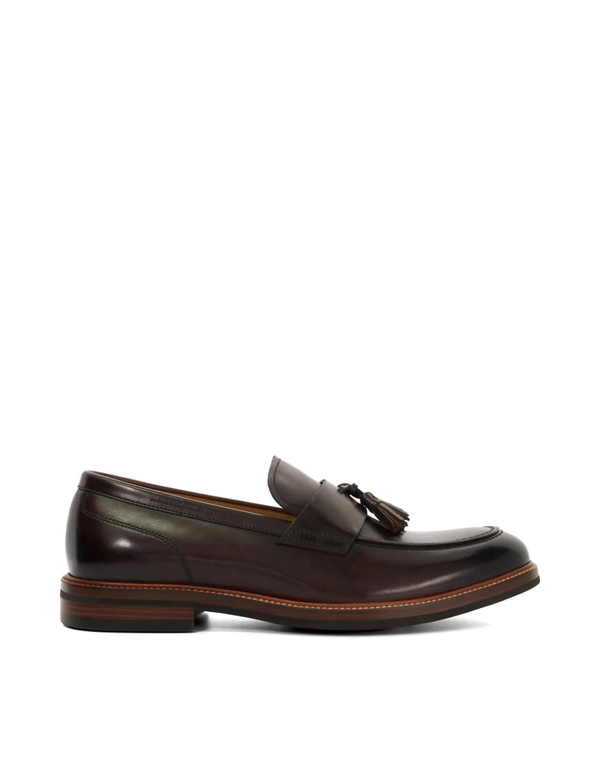 Brown leather loafers with a sleek design, featuring a decorative tassel and contrasting stitching on the sole, ideal for formal or smart-casual occasions.