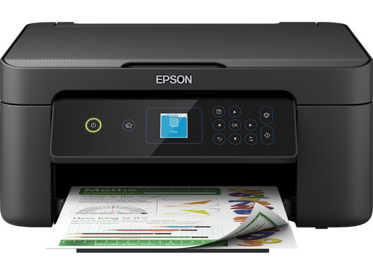 Compact black inkjet printer with a control panel featuring a blue display and buttons, printing colorful documents from a stack of paper.