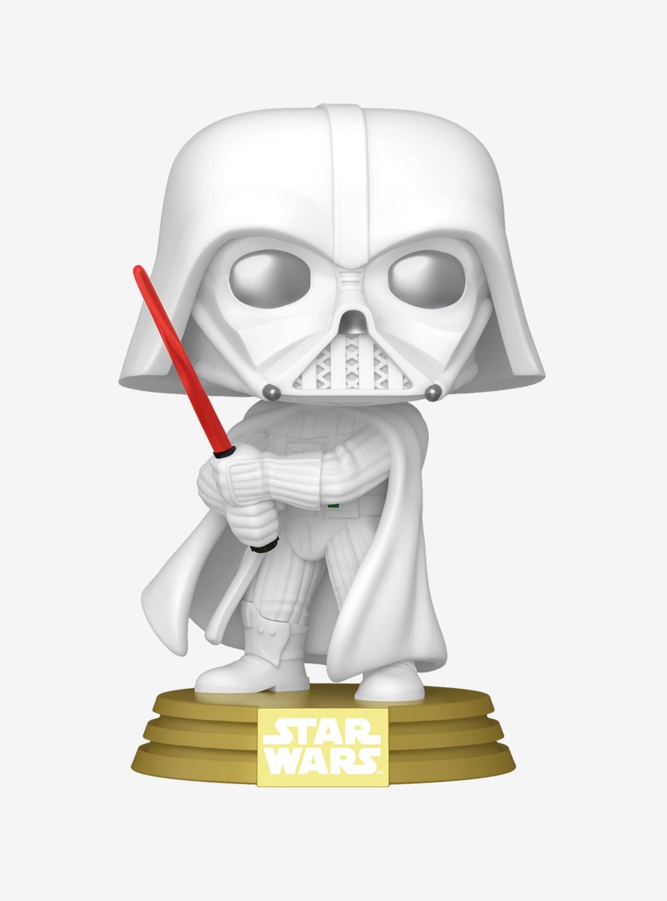Darth Vader Funko POP! figure in white vinyl, holding a red lightsaber, wearing a flowing cape, with large round eyes and a detailed helmet, mounted on a gold base with "Star Wars" logo.