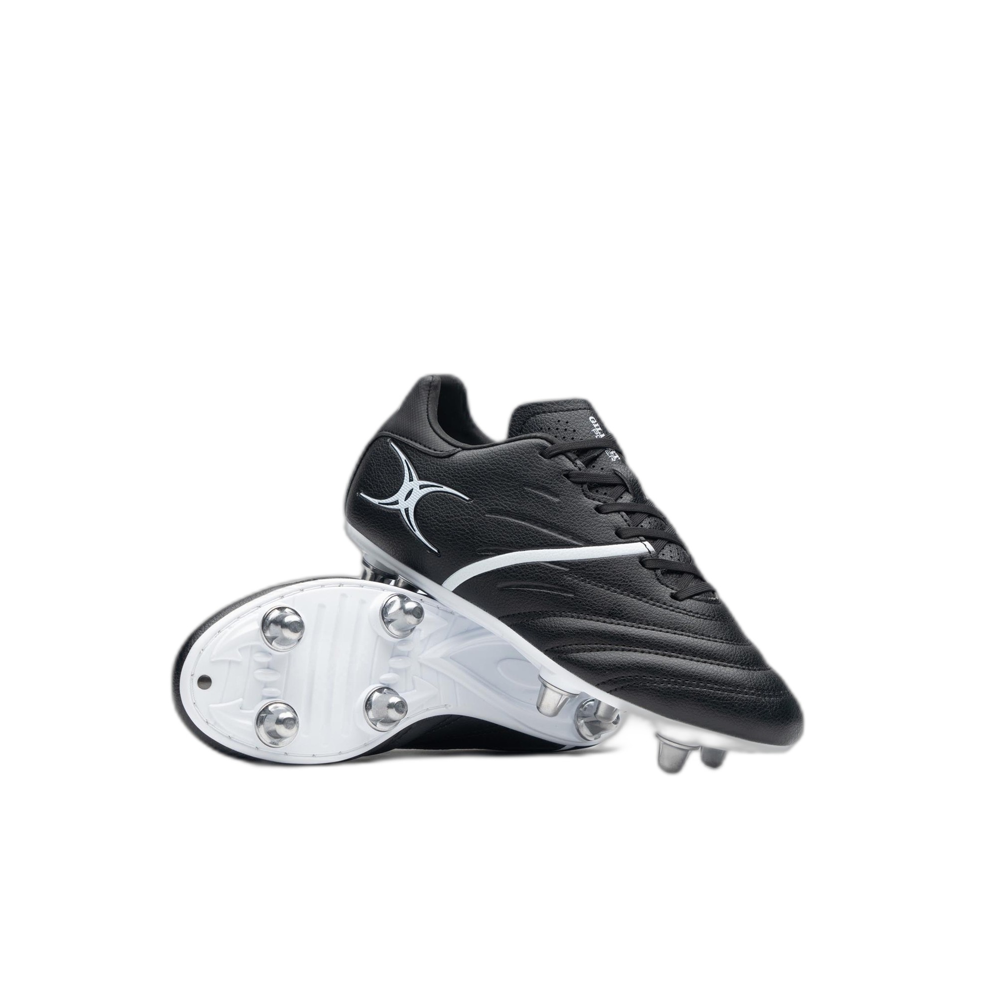 Black junior rugby boots with a sleek design, featuring a textured upper, white detailing, and six metal studs on a white outsole for enhanced traction.