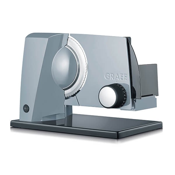 Silver electric slicer with a sleek design, featuring a round blade, adjustable thickness dial, and a black base, branded "Graef" on the side.