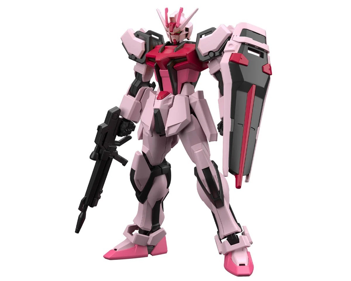 Gundam Entry Grade Strike Rouge model kit featuring a predominantly pink and white color scheme, equipped with a black rifle and a large shield, showcasing articulated joints and detailed design.