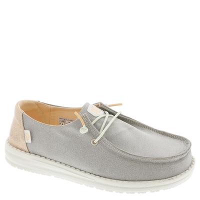 Women's HEYDUDE Wendy shoes in rose gold with metallic sparkle, featuring a soft grey fabric upper, lace-up design, and a lightweight white sole.