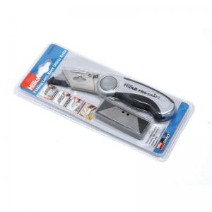 Hilka Lock Back Trimming Knife features a silver and black handle, a retractable blade, and comes packaged with a replacement blade in a clear plastic blister pack.
