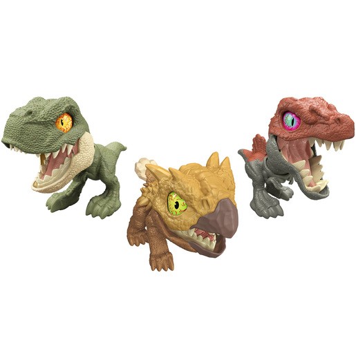 Three colorful dinosaur figures from Jurassic World, featuring textured surfaces, vibrant eyes, and varied designs, showcasing a mix of green, brown, and red tones.